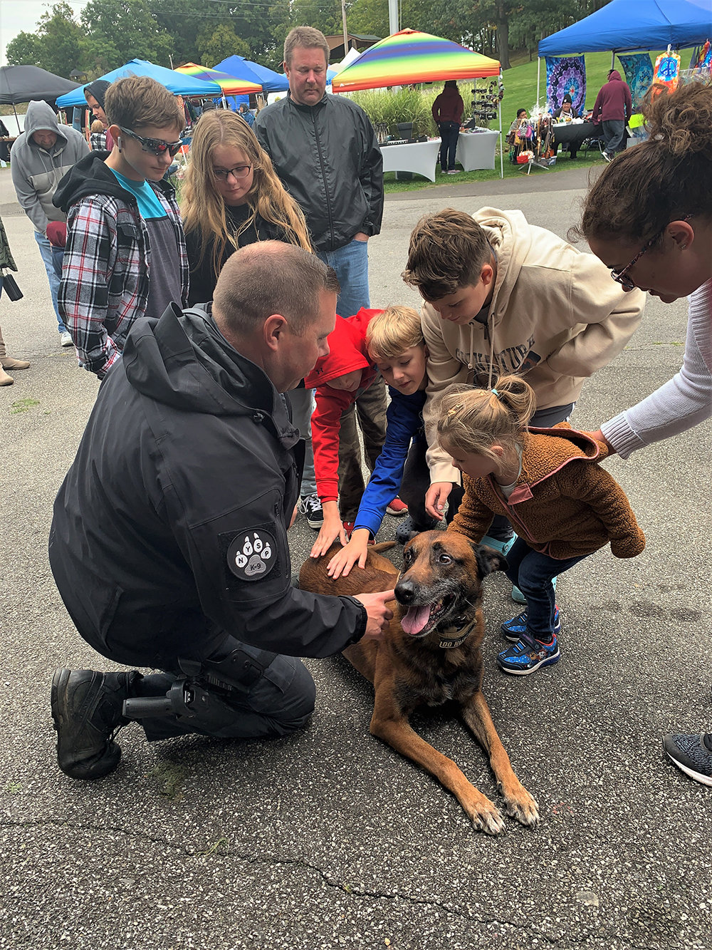 A NYS Police officer allowed the kids to pet one of his prized K9 dogs